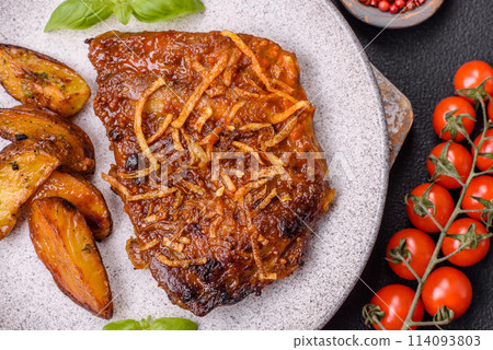 Delicious pork or beef ribs baked on the grill with salt, spices and herbs Delicious pork or beef ribs baked on the grill with salt, spices and herbs 114093803