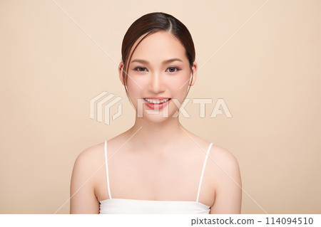 Beautiful young asian woman with clean fresh skin on beige background, Face care, Facial treatment, Cosmetology, beauty and spa, Asian women portrait. 114094510