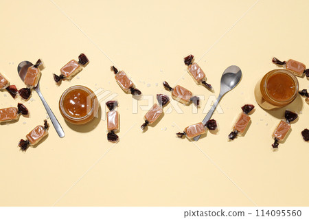 Salted caramel candies on a light background 114095560