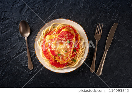 Chicken Parmesan, Italian pasta dish. Breaded chicken breast with cheese 114095843