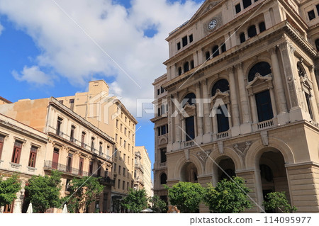 View of the clear sky and cityscape from San Francisco Square in Old Havana (Havana, Cuba) View of the clear sky and cityscape from San Francisco Square in Old Havana (Havana, Cuba) 114095977