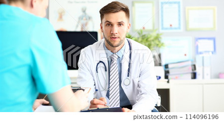Concerned bearded doctor Concerned bearded doctor 114096196