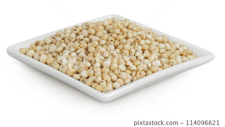 Sorghum seeds in ceramic bowl isolated on white background with full depth of field. Sorghum seeds in ceramic bowl isolated on white background with full depth of field. 114096621