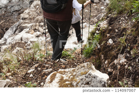 senior friends tourists outdoor adventure together on mediterranian sea landscape senior friends tourists outdoor adventure together on mediterranian sea landscape 114097007