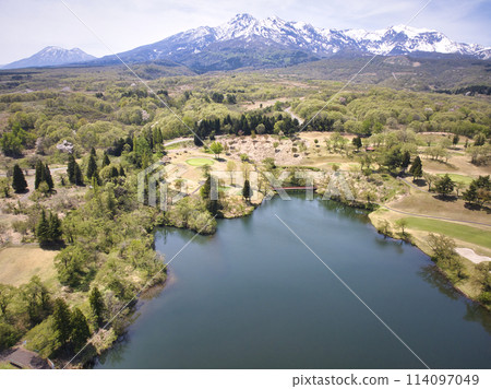 Matsugamine Pond and the beautiful Mt. Myoko, Joetsu City, Niigata Prefecture (aerial photography by drone) 114097049