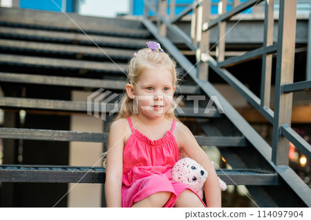 Child walks with cochlear implant system. Installation cochlear implant on child girl ear for restores hearing. Kid hears after hear return to normal. Diversity inclusion concept. Child walks with cochlear implant system. Installation cochlear implant on child girl ear for restores hearing. Kid hears after hear return to normal. Diversity inclusion concept. 114097904