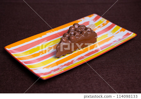 children's chocolate dessert on a bright plate children's chocolate dessert on a bright plate 114098133