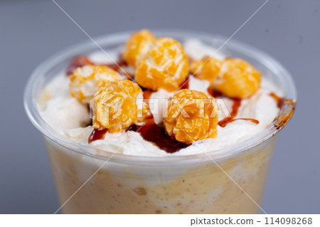 childish sweet cocktail with popcorn close up childish sweet cocktail with popcorn close up 114098268