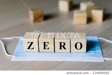 Blue surgical face mask with wood block word zero. Coronavirus. Zero covid china, Medical concept. 114099365