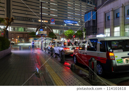 A line of taxis in the Tenjin area of Fukuoka city A line of taxis in the Tenjin area of Fukuoka city 114101618