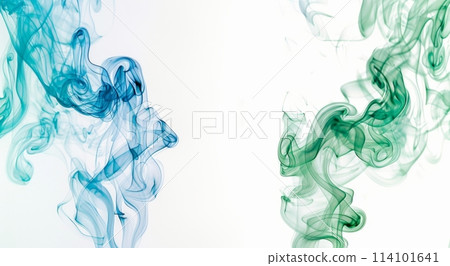 Waves of green and blue smoke create an ethereal and fluid form on a white background, suggesting graceful movement 114101641