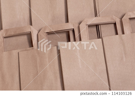 paper bags with handles for shopping. craft paper bag. paper bags with handles for shopping. craft paper bag. 114103126