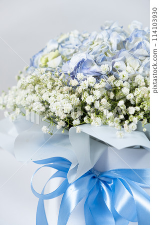 Bouquet of flowers made of hydrangeas and gypsophila Bouquet of flowers made of hydrangeas and gypsophila 114103930