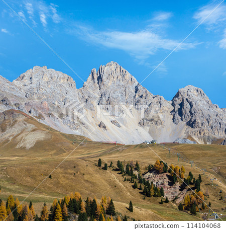 Autumn alpine mountain lake near San Pellegrino Pass, Trentino, Dolomites Alps, Italy. 114104068
