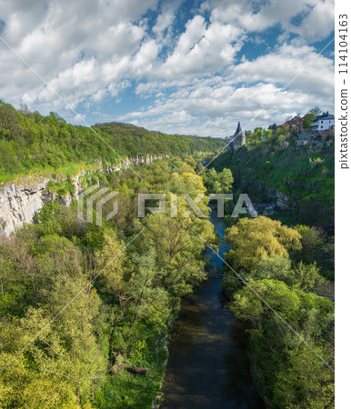 View from Novoplanivskiy Bridge to the Smotrych River Canyon, Kamianets-Podilskyi, one of the most popular towns for travel in Ukraine. View from Novoplanivskiy Bridge to the Smotrych River Canyon, Kamianets-Podilskyi, one of the most popular towns for travel in Ukraine. 114104163