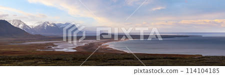 View during auto trip in West Iceland highlands, Snaefellsnes peninsula, Snaefellsjokull National Park. Spectacular volcanic tundra landscape with mountains, craters, rocky ocean coast. 114104185