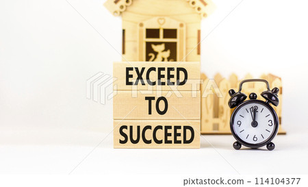 Exceed to succeed symbol. Concept words Exceed to succeed on beautiful wooden blocks. Beautiful white table white background. Black alarm clock. Business and exceed to succeed concept. Copy space. Exceed to succeed symbol. Concept words Exceed to succeed on beautiful wooden blocks. Beautiful white table white background. Black alarm clock. Business and exceed to succeed concept. Copy space. 114104377