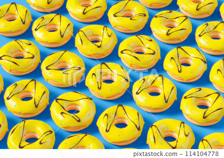 Trendy sunlight Summer pattern made with glazed donut with sprinkles on a blue 114104778