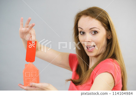 Woman buying house in low price. Woman buying house in low price. 114104984