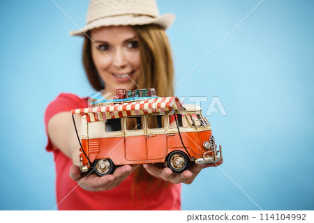Holiday woman with camper van trailer 114104992