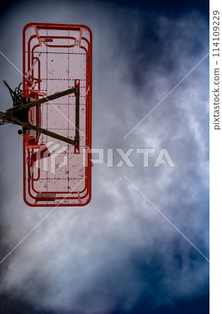 directly underneath a caged aerial work platform lift. 114109229