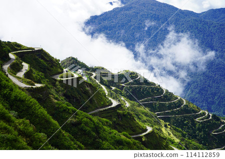 Zig Zag Road with Green Nature view of Old Silk Route Sikkim 114112859