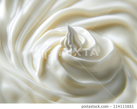 Close-up of a creamy, swirling texture with a smooth, peak twist. 114113881