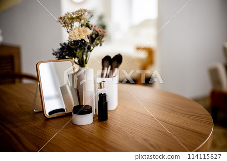 A table with cosmetic items A table with cosmetic items 114115827