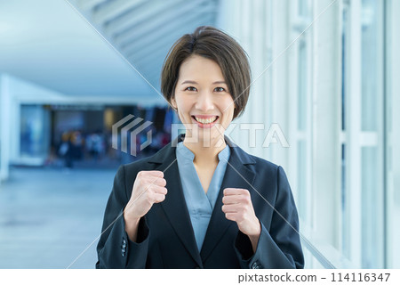 Business woman doing a fist pump 114116347