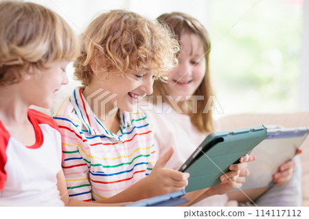 Kids with mobile phone. Child with tablet computer Kids with mobile phone. Child with tablet computer 114117112