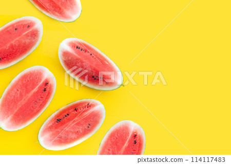 Watermelon on yellow background. Copy space 114117483