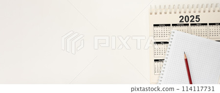 Calendar Year 2025 schedule with blank note for to do list on paper background. Flat lay with calendar, pencil on calander 2025. page of calendar 2025. isolated on white Calendar Year 2025 schedule with blank note for to do list on paper background. Flat lay with calendar, pencil on calander 2025. page of calendar 2025. isolated on white 114117731