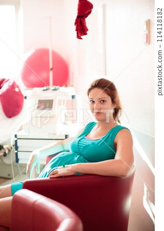 Young mother giving birth to a baby 114118182