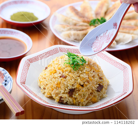 Chinese food fried rice and dumplings 114118202