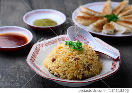 Chinese food: fried rice and dumplings with sauce and matcha salt Chinese food: fried rice and dumplings with sauce and matcha salt 114118203