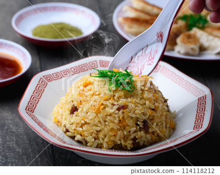 Chinese food: fried rice and dumplings with sauce and matcha salt 114118212