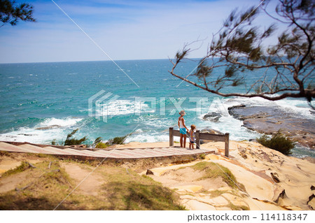 Family hiking. Mountain sea view. Travel with kids 114118347