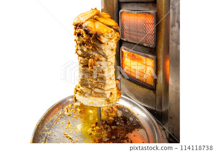 Lamb on skewer grilled using Electric stove, focus selective Lamb on skewer grilled using Electric stove, focus selective 114118738