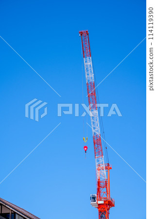 Crane carrying building construction materials | Urban development image | Construction image 114119390