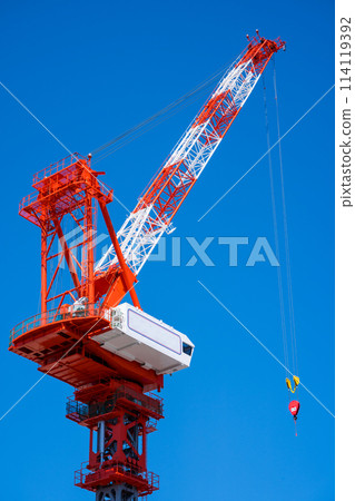Crane carrying building construction materials | Urban development image | Construction image Crane carrying building construction materials | Urban development image | Construction image 114119392