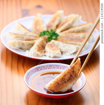 Put dumplings on the sauce Put dumplings on the sauce 114119589