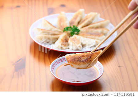 Put dumplings on the sauce Put dumplings on the sauce 114119591