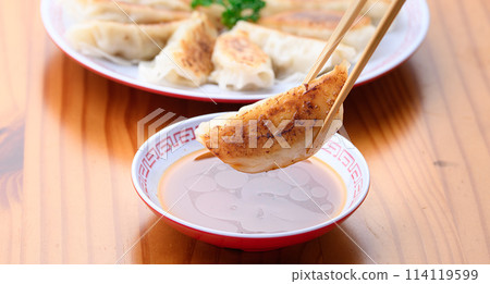 Put dumplings on the sauce 114119599