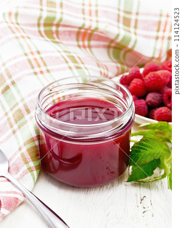 Jam of raspberry in jar on table Jam of raspberry in jar on table 114124523