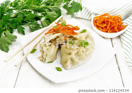 Patties pegodi with spicy carrots in plate on light board Patties pegodi with spicy carrots in plate on light board 114124534