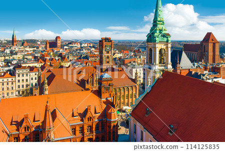 Aerial panoramic view of historical buildings and roofs in Polish medieval town Torun Aerial panoramic view of historical buildings and roofs in Polish medieval town Torun 114125835