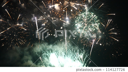 Green Firework celebrate anniversary happy new year 2022, 4th of july holiday festival. Green firework in night time celebrate national holiday. Countdown to new year 2022 festival party time event Green Firework celebrate anniversary happy new year 2022, 4th of july holiday festival. Green firework in night time celebrate national holiday. Countdown to new year 2022 festival party time event 114127726