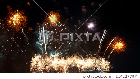 Colorful vibrant Firework celebrate anniversary happy new year 2022, 4th of july holiday festival. colorful firework in the night time to celebrate national holiday. countdown new year 2022 party time 114127797