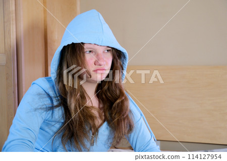 After sleepless night sad woman got up sit on bed thinking, lost in sad thoughts about irreparable mistake decision about abortion, feeling remorse, break up in relations, divorce and jealousy concept 114127954