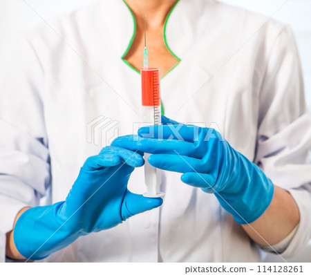 Doctor with syringe Doctor with syringe 114128261